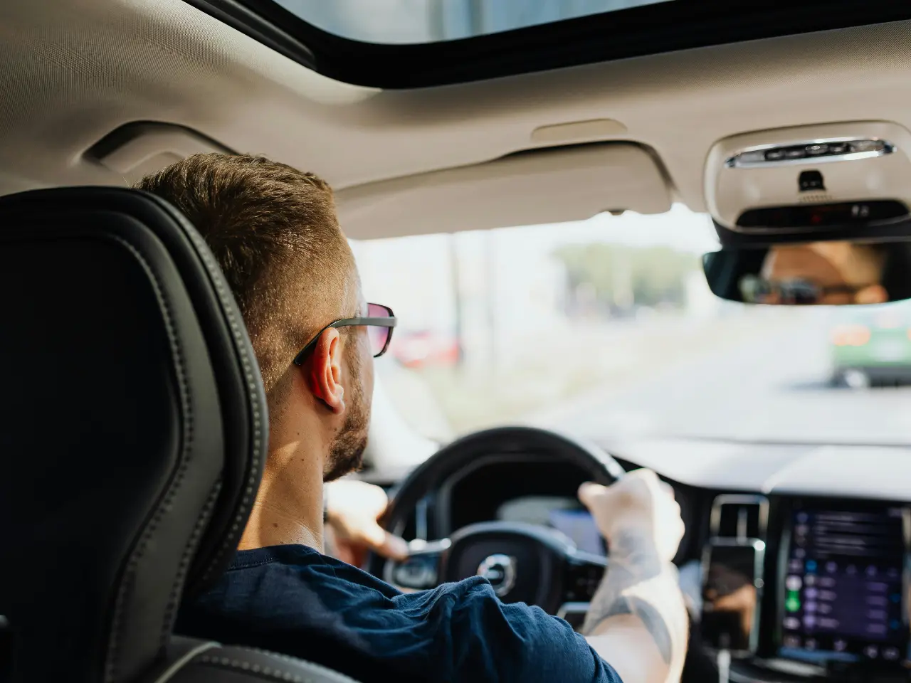 Driver completing a road test after meeting ICBC licensing requirements