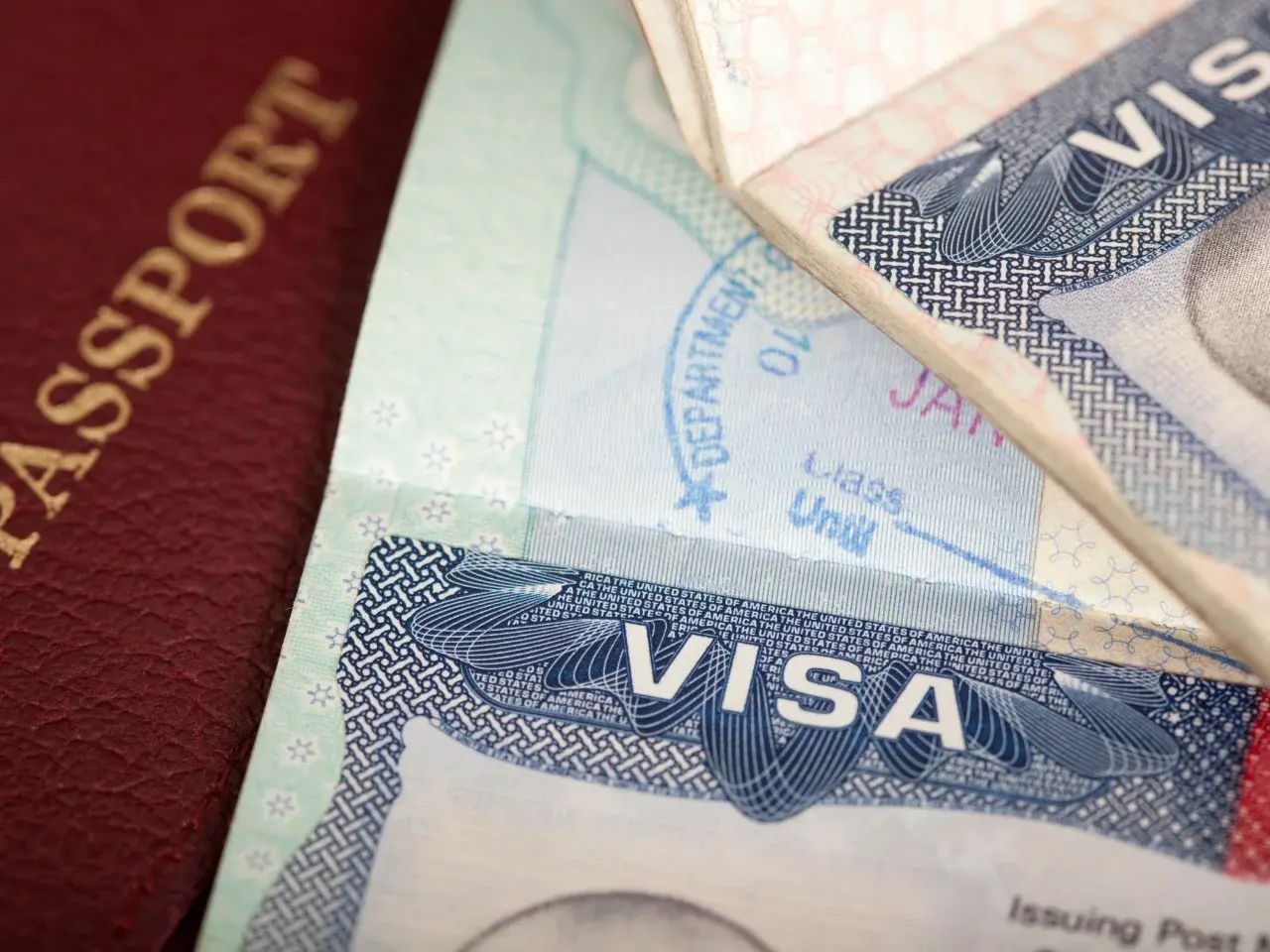Passport and visa pages representing document authentication and legalization for UAE use.