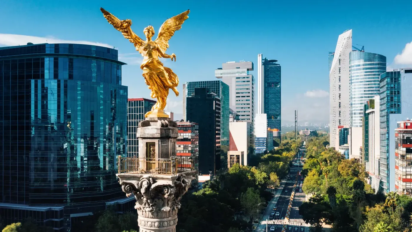 The skyline of Mexico City shows how many Canadians have bought a property in Mexico.