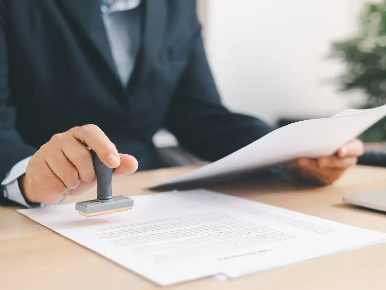 Notarizing and signing documents for a real estate transaction in Mexico.