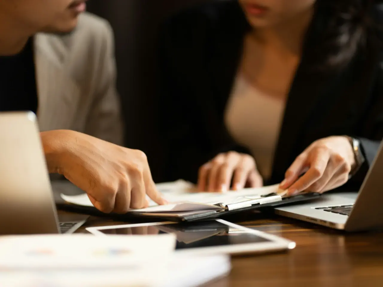 Consultation between professionals about how to authenticate a document in Canada.