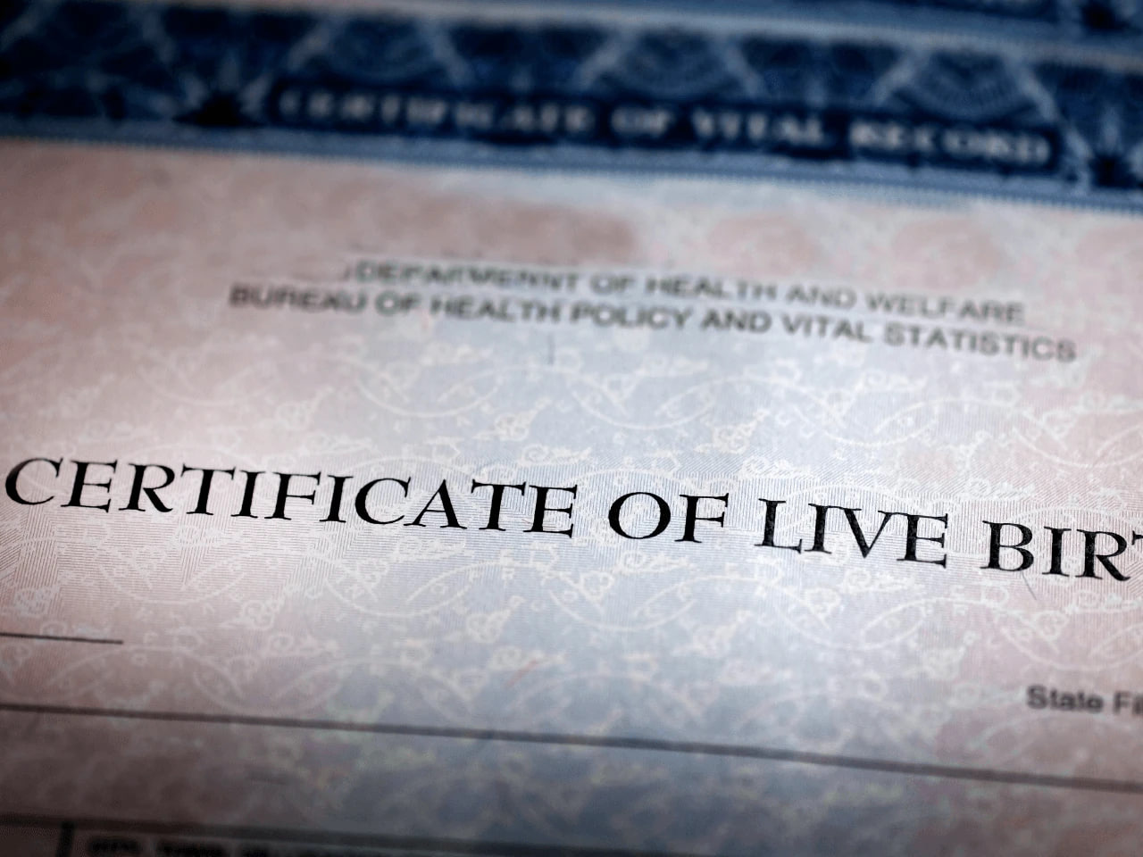 Close-up of an official birth certificate document used for identification and legal purposes.