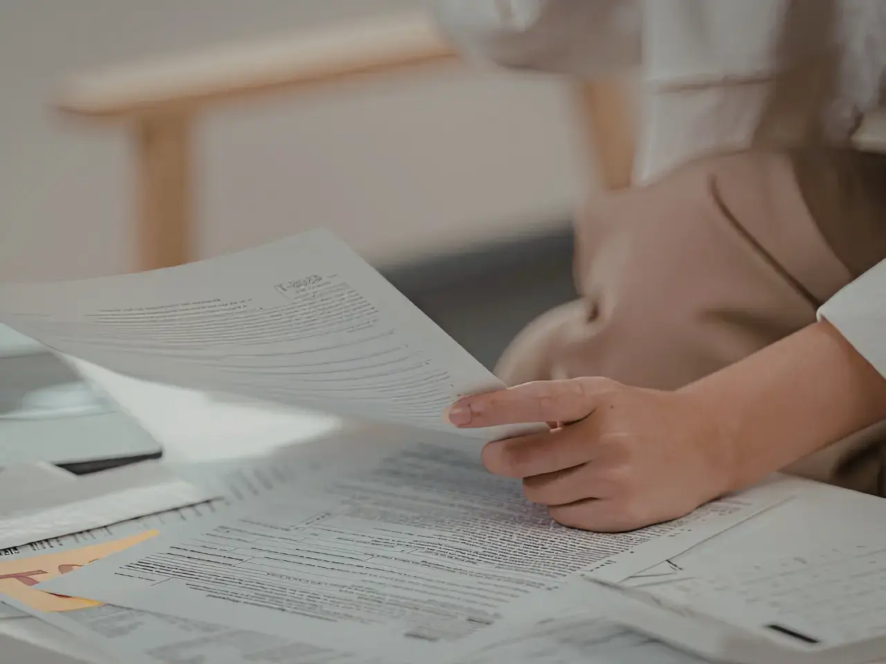 Reviewing official paperwork before submitting documents for authentication in Ontario.