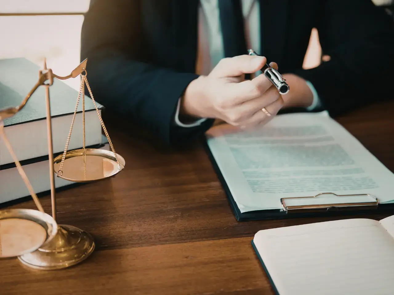 Legal professional reviewing documents for authentication or apostille processing.
