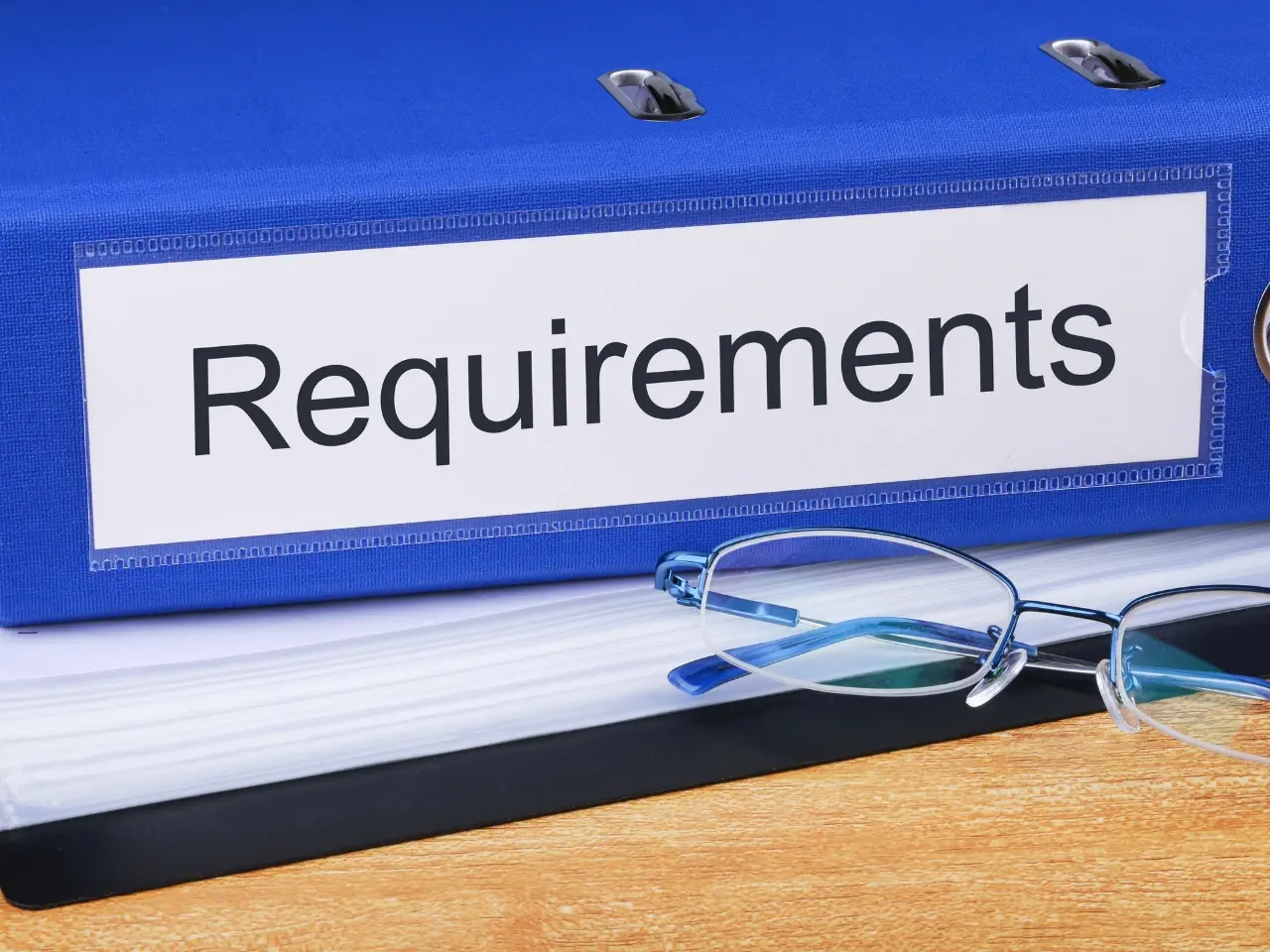 Folder labelled requirements, representing documents needed for an Ontario birth certificate.