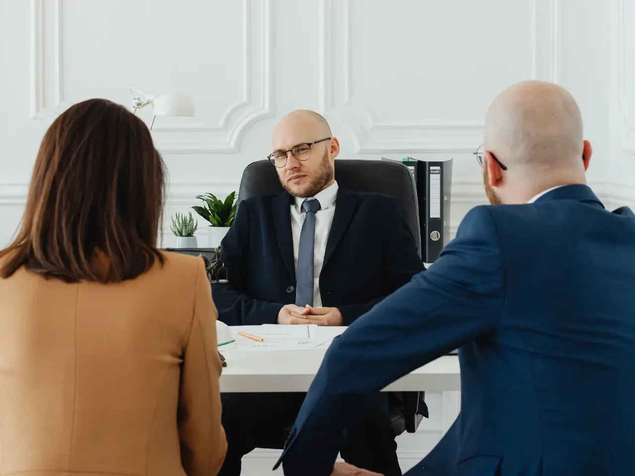 Meeting with a legal professional about divorce certificate eligibility.