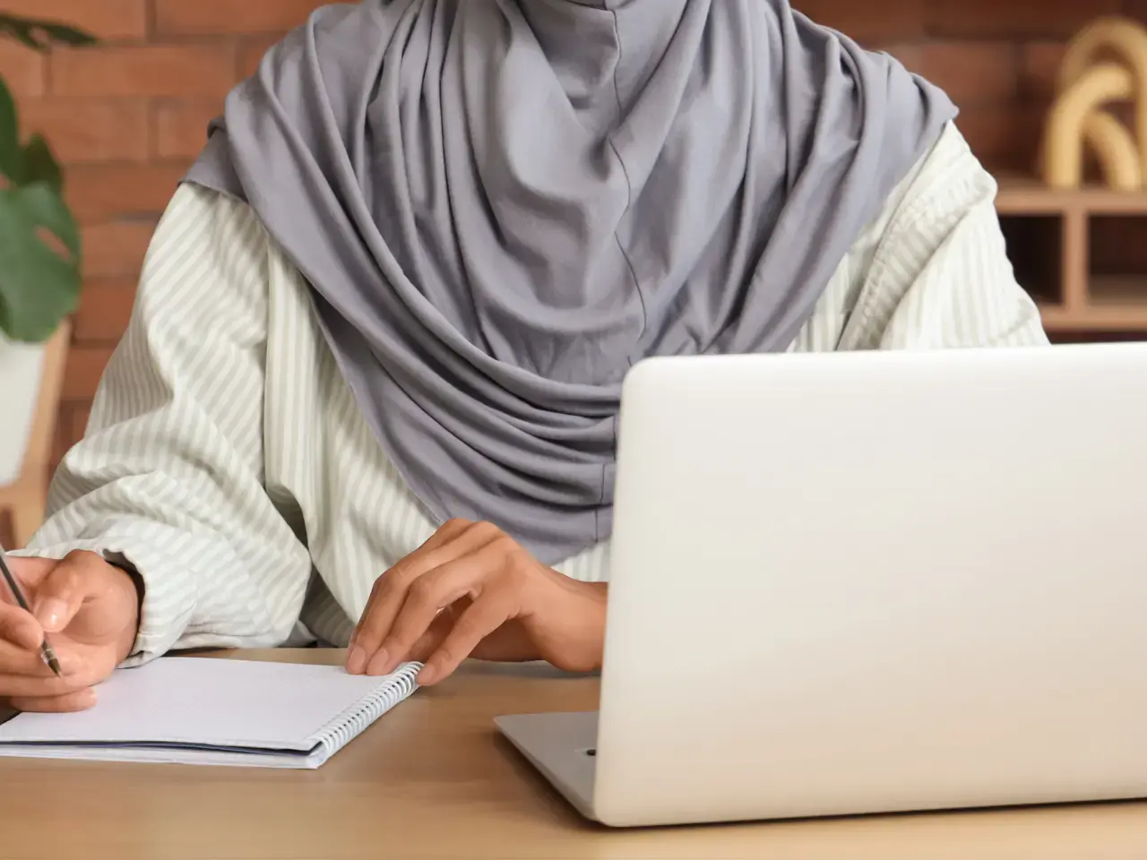 Person preparing documents for marriage certificate attestation.