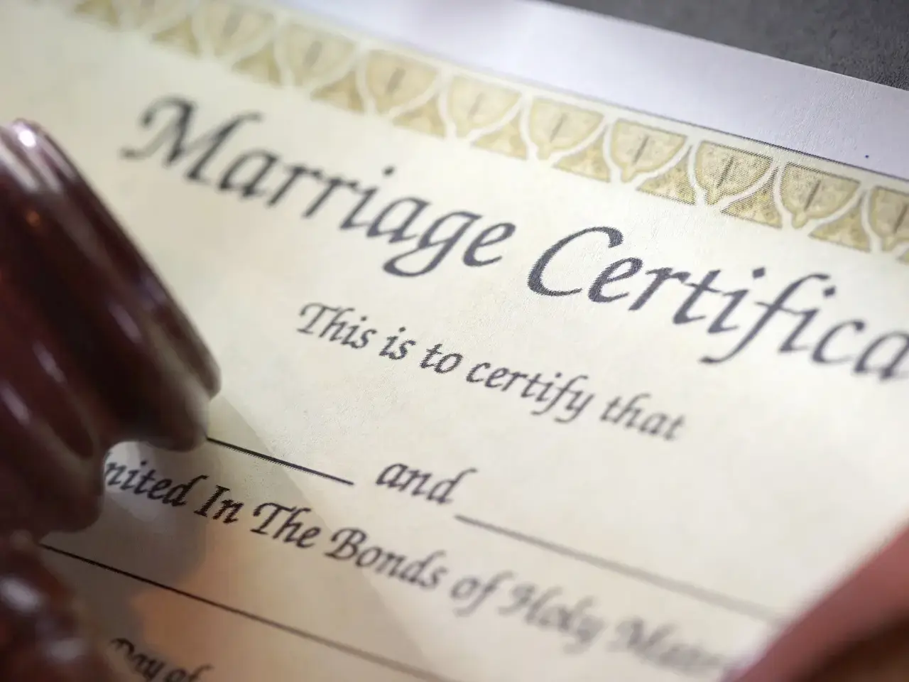 Marriage certificate being stamped for embassy legalization.