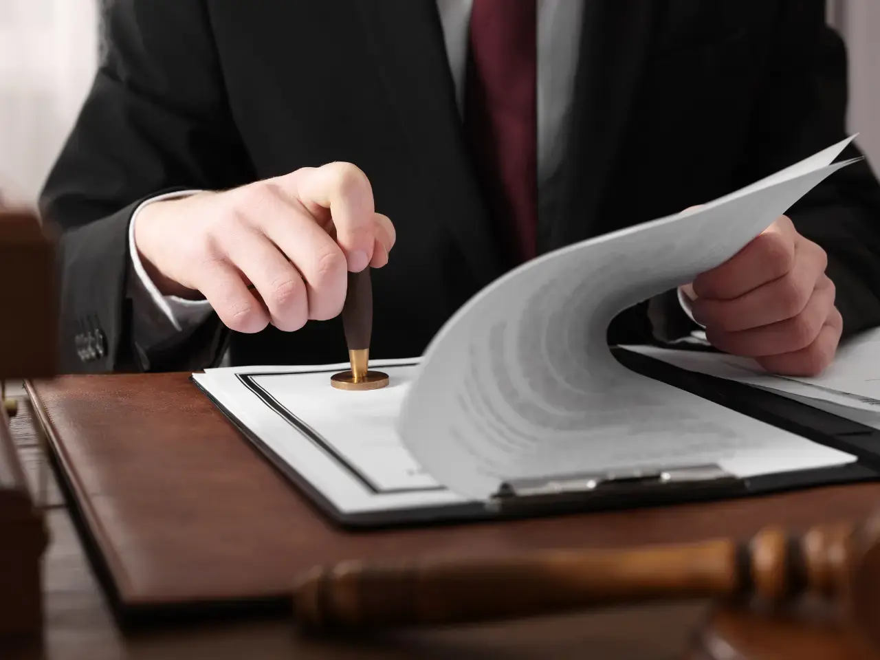 Legal professional reviewing the marriage certificate for the UAE legalization.