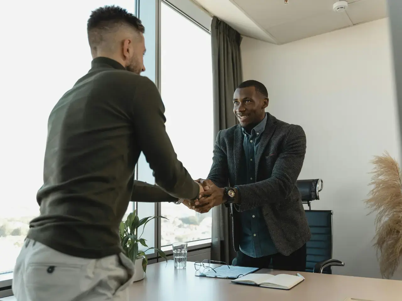 Client meeting with a professional to confirm country requirements and eligibility before submitting documents to ODS.