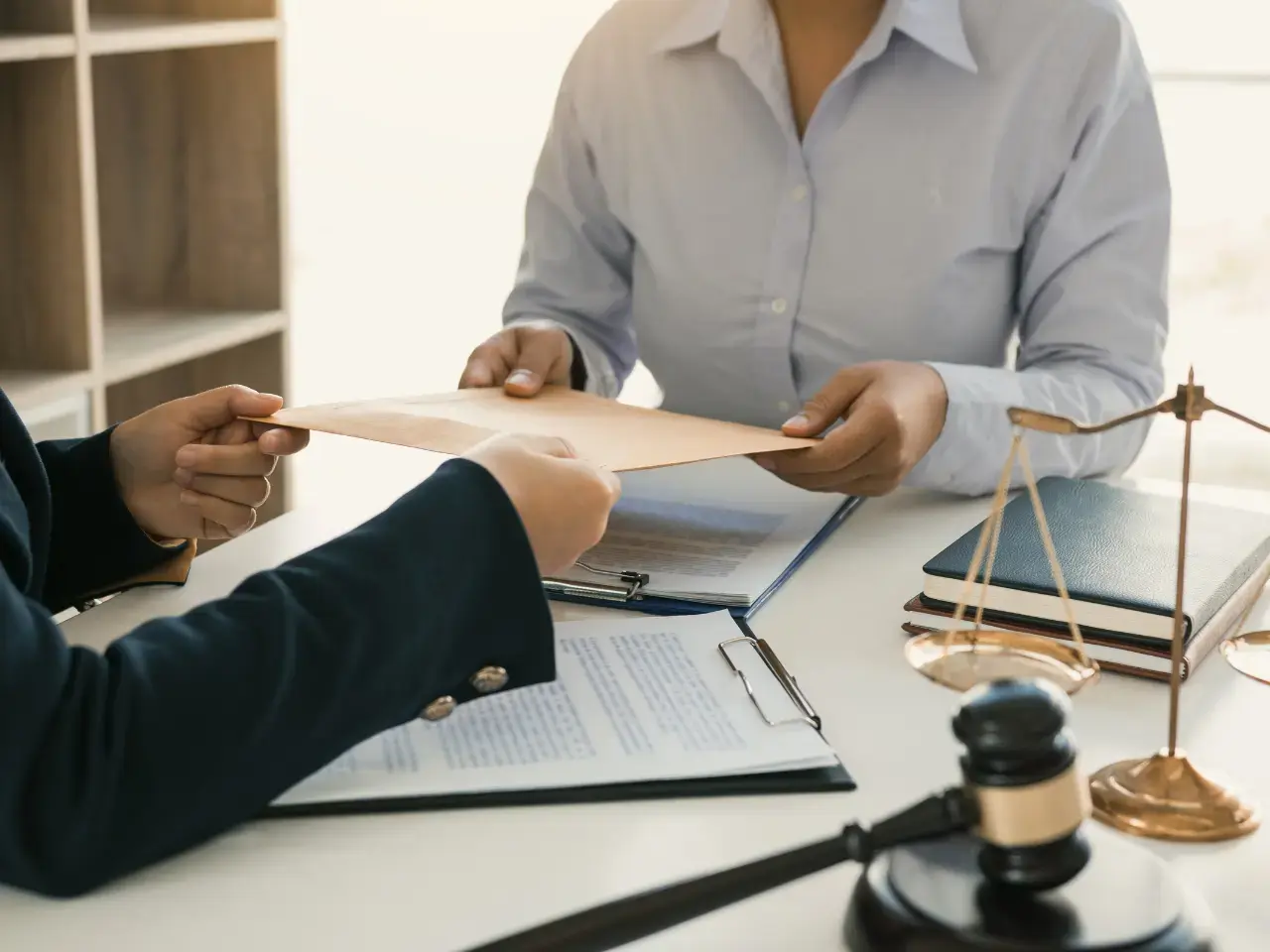 Professional reviewing notarized documents with stamps and seals, illustrating ODS submission requirements and important pre-submission checks.