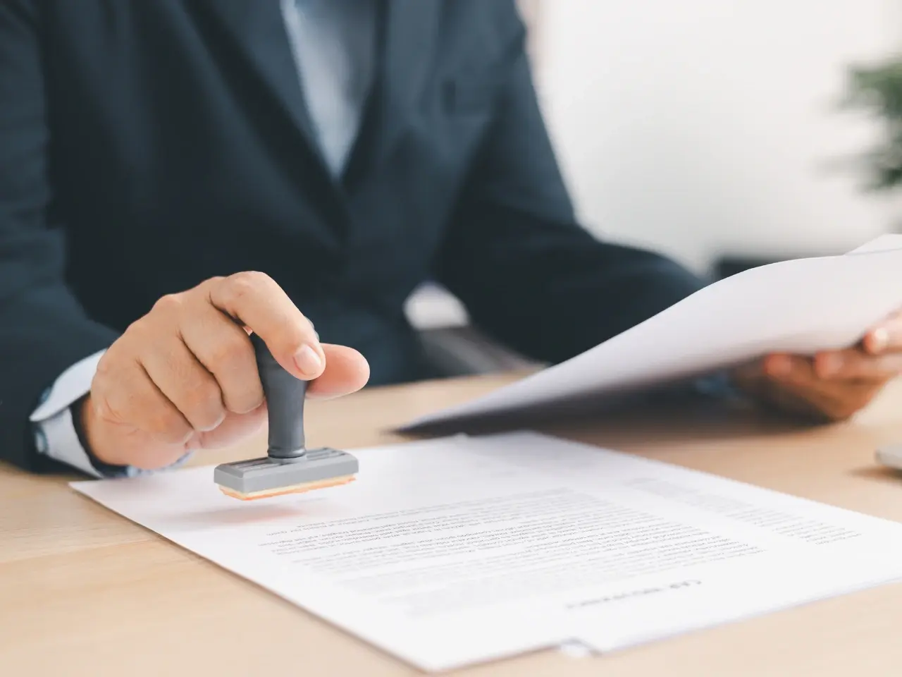 Document being stamped during authentication or apostille.