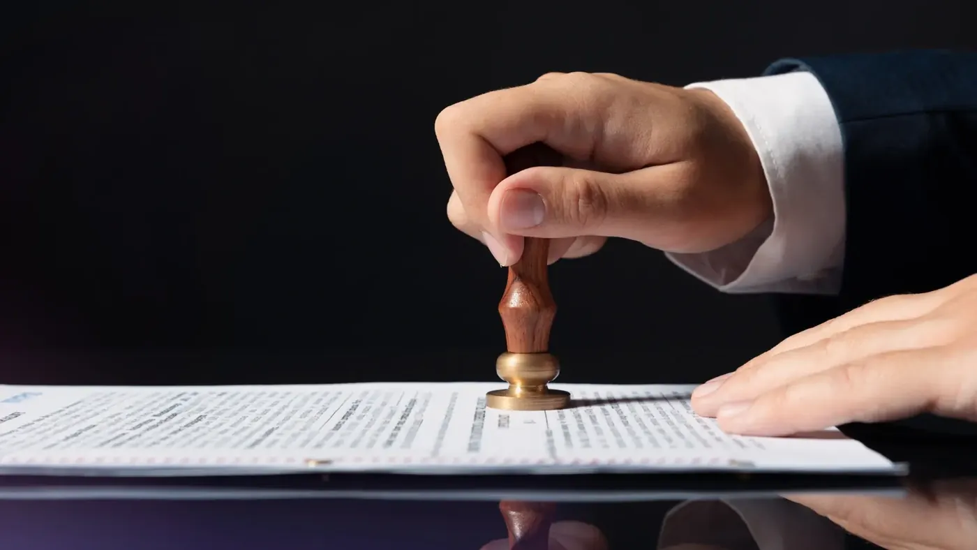 Stamping an official document for international authentication.