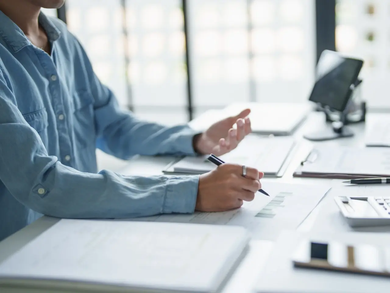Professional handling of documents for apostille services.