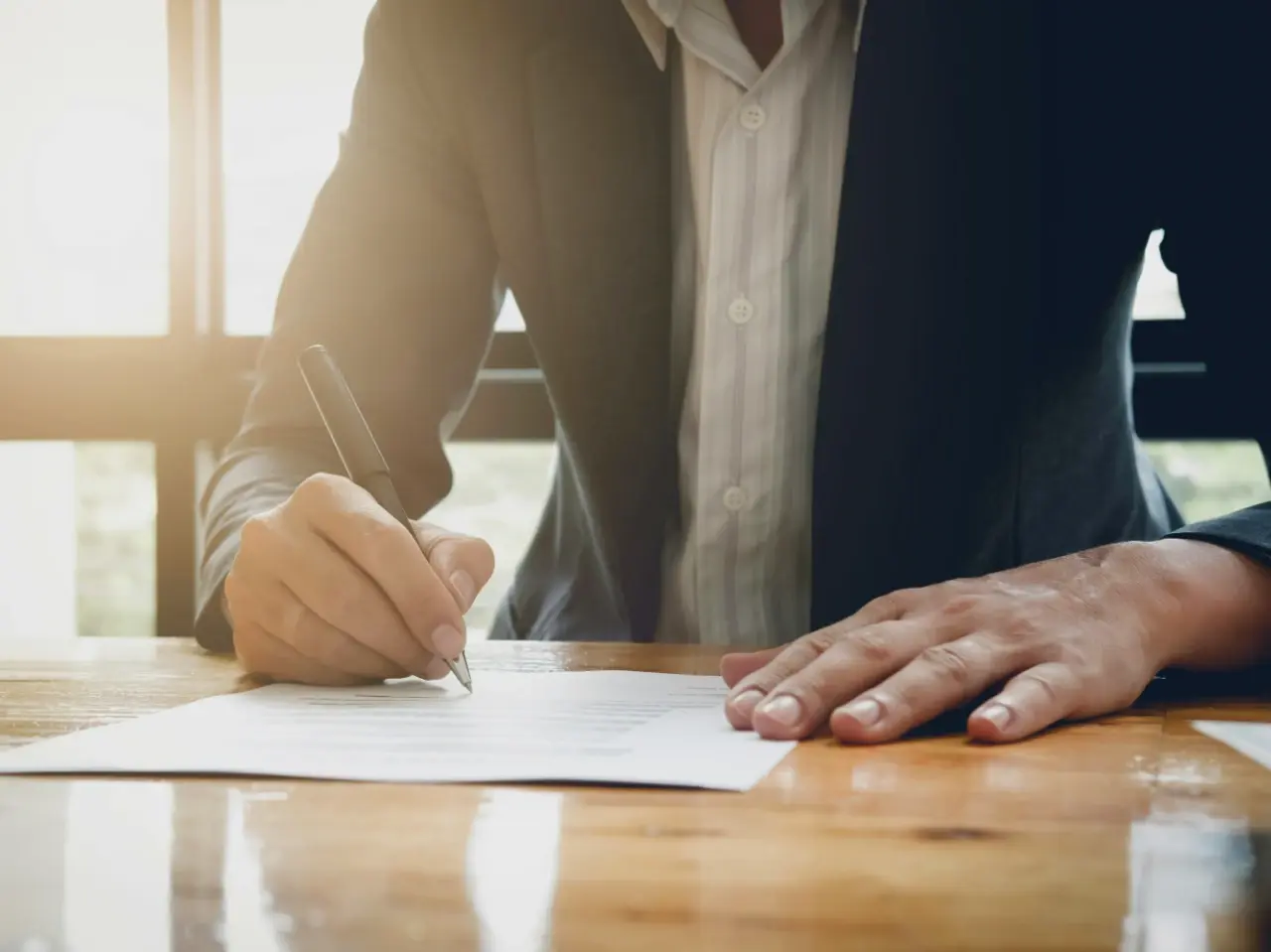 Person signing an eligible document for authentication in Canada before apostille and/or legalization.
