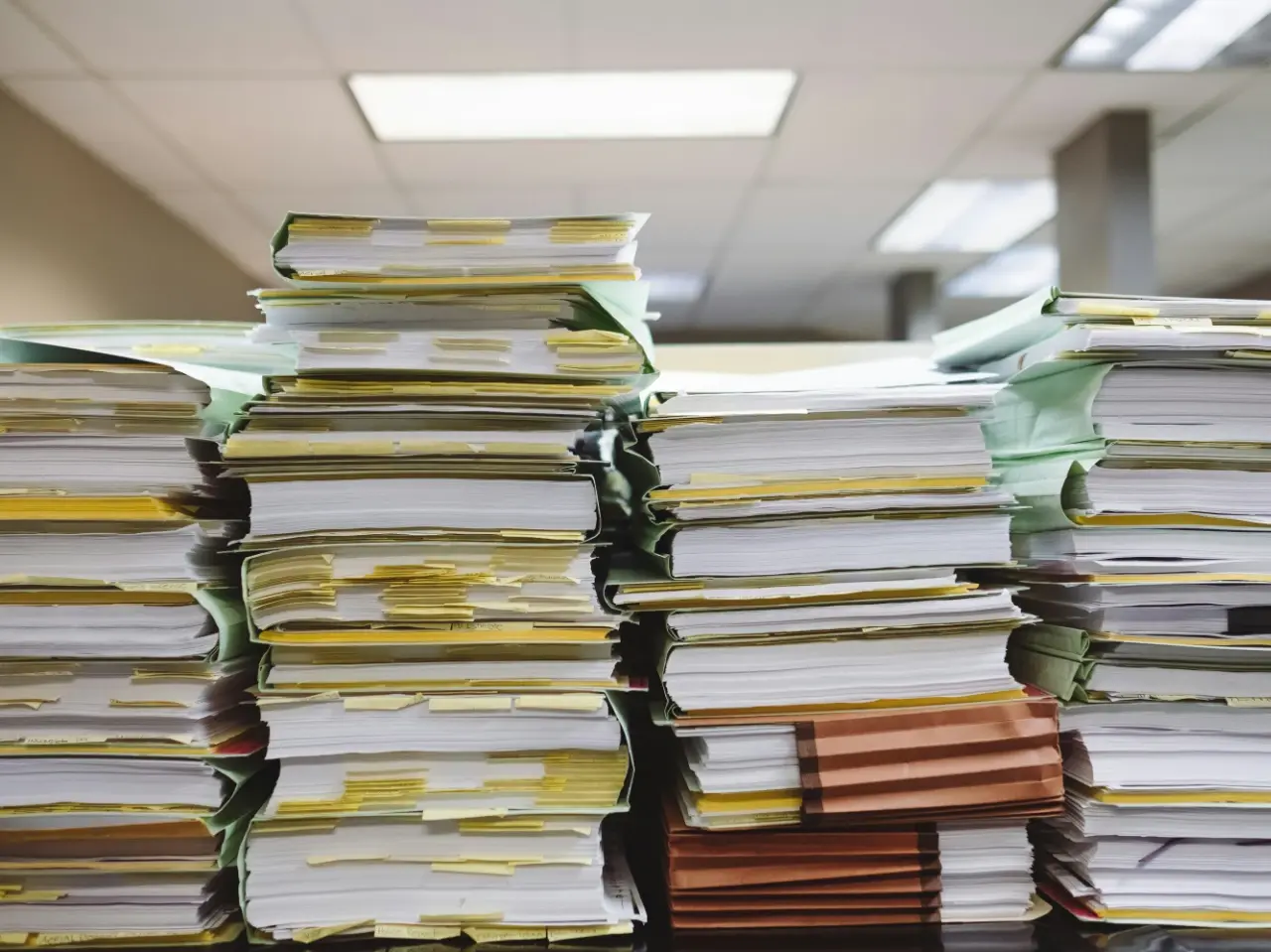 Stacks of official documents prepared for the step-by-step apostille process in Canada.