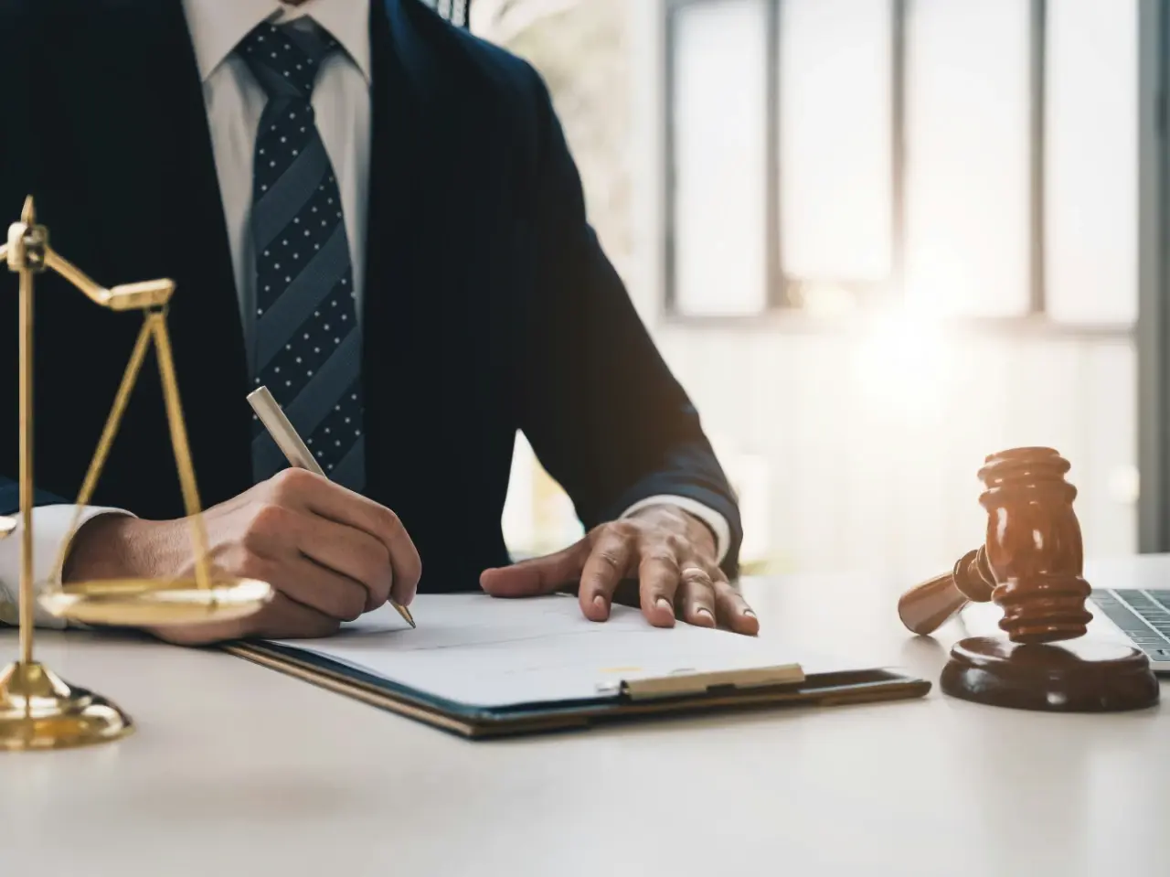 Lawyer preparing an apostille for Canadian legal documents at an office desk.