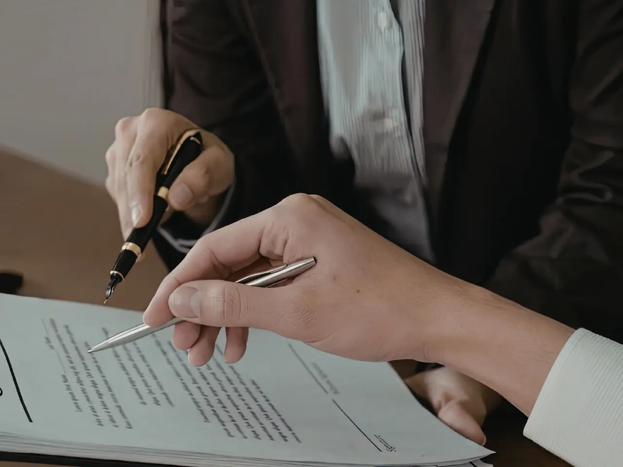 Signing documents during the apostille or full legalization process.