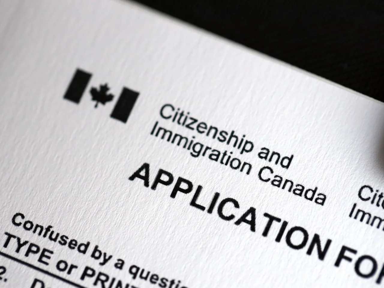 Canadian citizenship application form and supporting documents for a child born abroad.