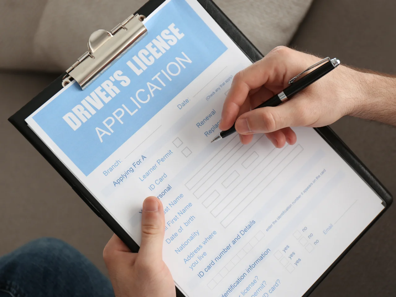 Applicant completing an Alberta driver's licence application to exchange a foreign driver's licence.