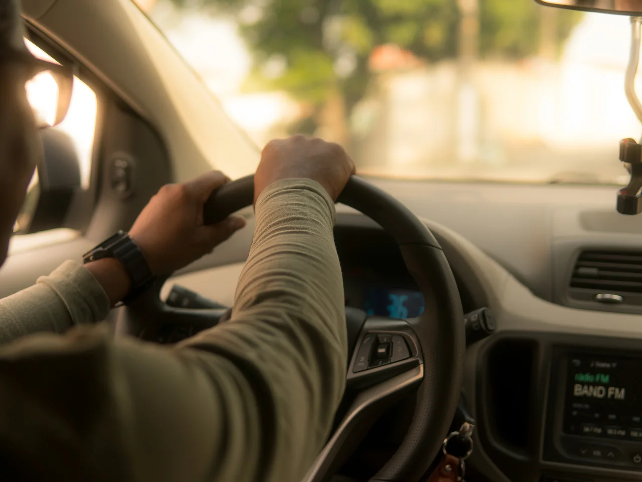 Driver operating a passenger vehicle, representing recognized driving experience for exchanging a foreign driver's licence in Quebec.