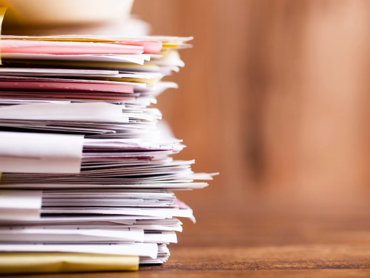 Stack of supporting documents prepared for IRCC translation requirements