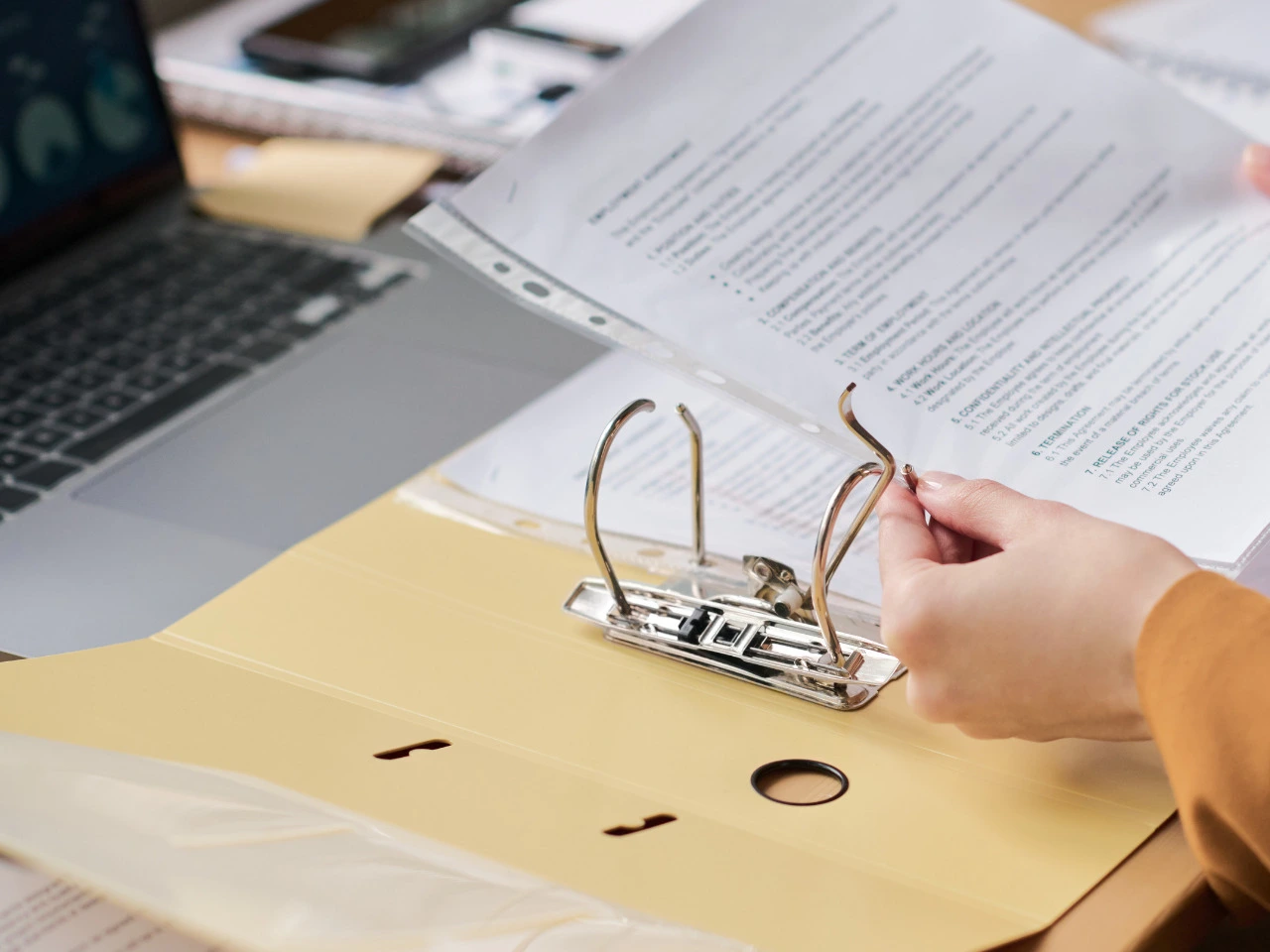Reviewing legal name change forms and supporting documents before submission.
