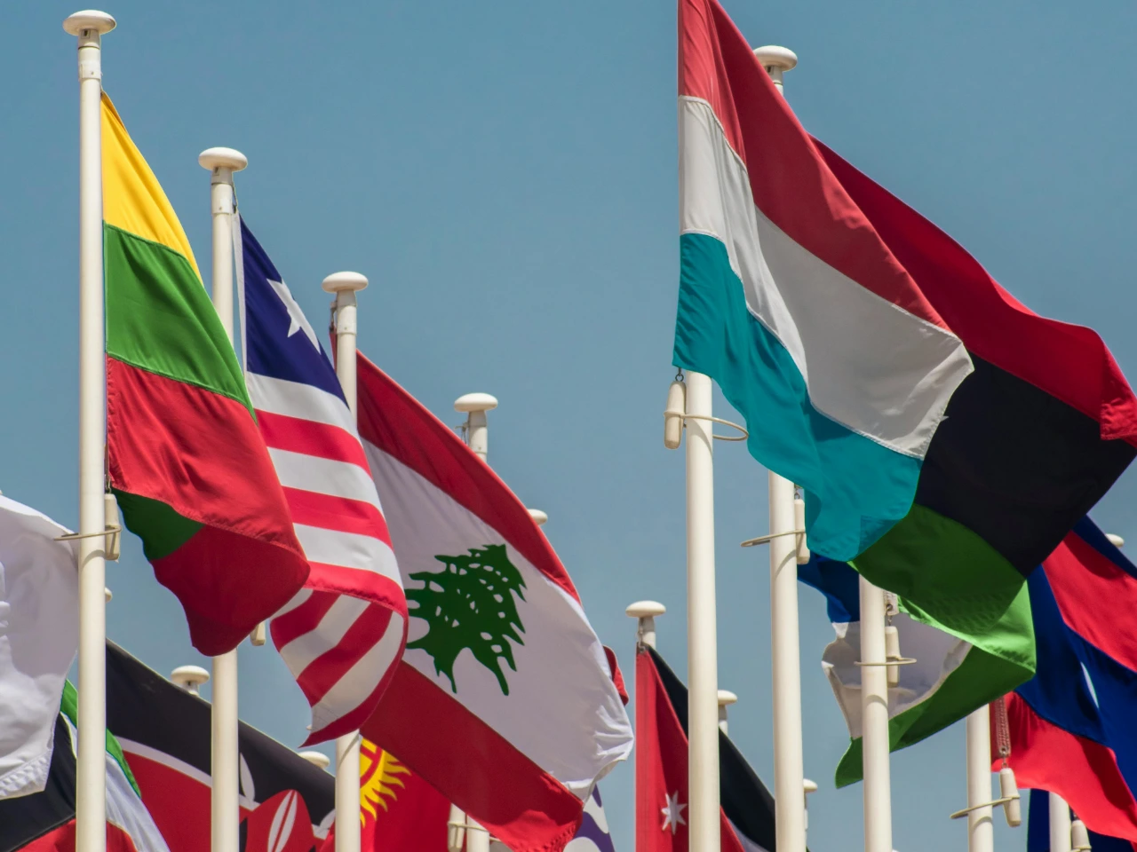 Flags representing Canadian immigration requirements.