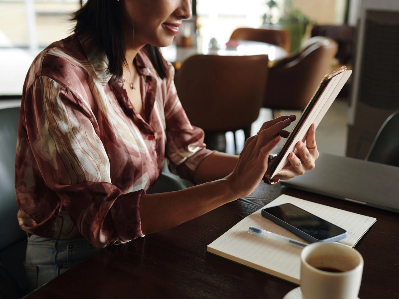 Applicant reviewing immigration documents on a tablet.