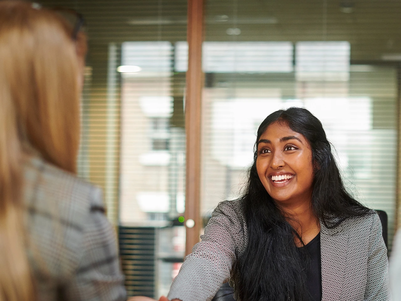 An applicant discussing a police certificate application with an immigration advisor