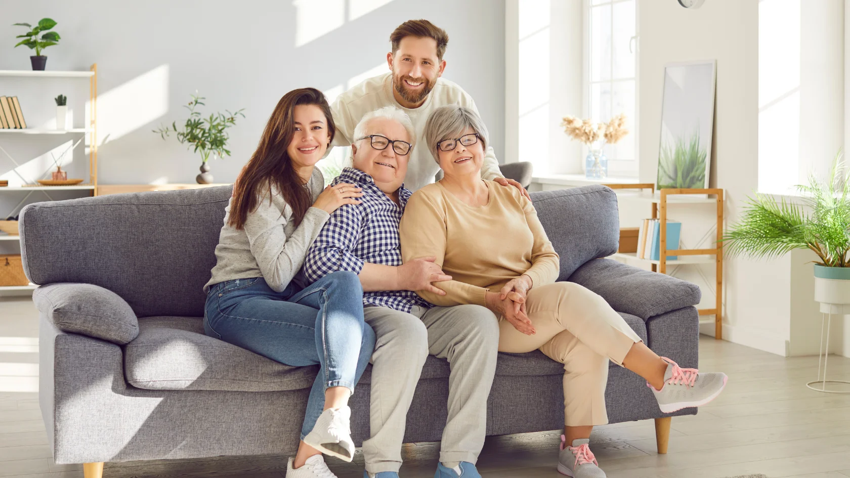Canadian family spending time together at home, representing a Super Visa visit for parents and grandparents.