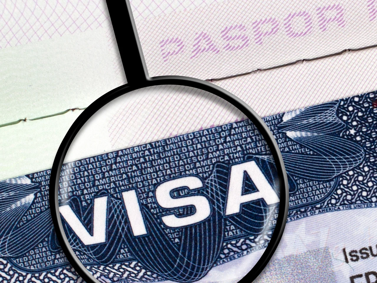 A visa document viewed under a magnifying glass, representing a Super Visa application for parents and grandparents.
