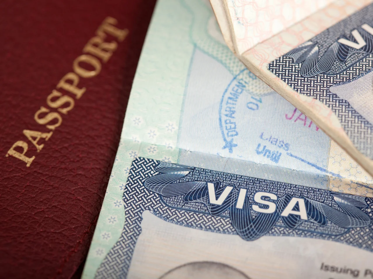 Passport and visa documents representing international travel to Canada for a Super Visa application.
