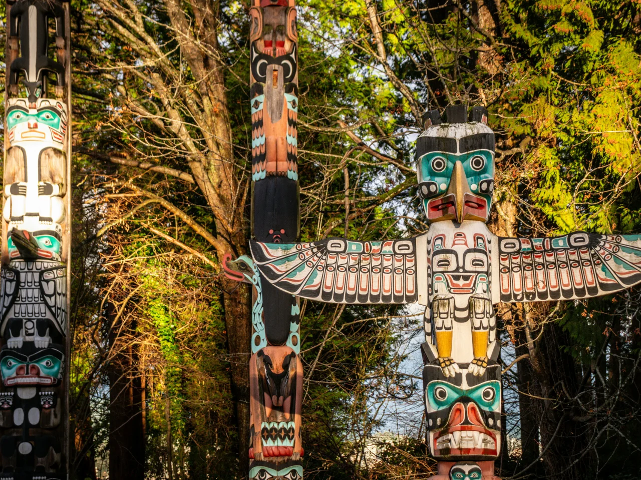 Indigenous totem poles representing Indigenous languages and cultural heritage in Canada.
