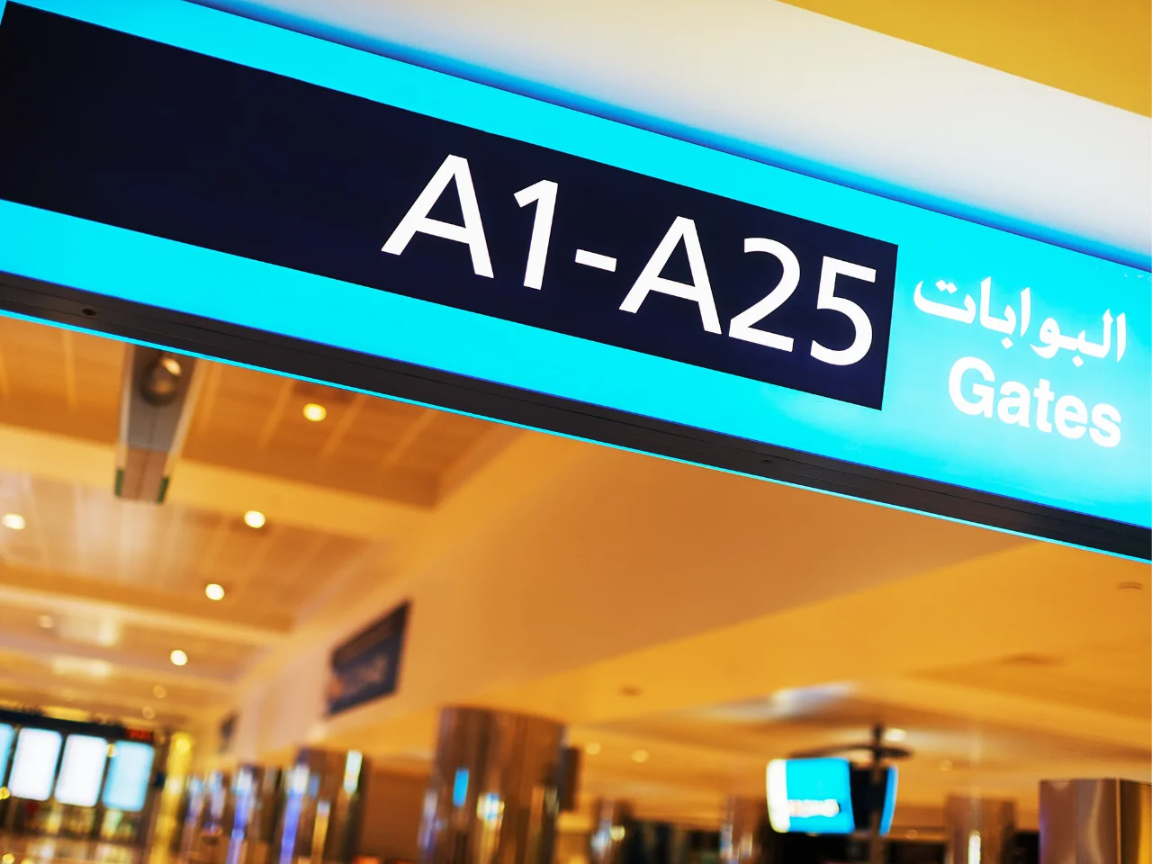 Airport departure gate sign representing visa on arrival and entry procedures for Indian passport holders travelling to the UAE.