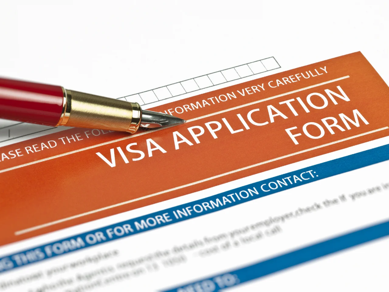 UAE visa application form and pen, representing the online visa application process for Indian passport holders.